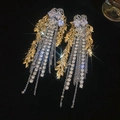 Detailed macro view of cascading diamond tassels and golden leaf clusters on earrings - Flower Wheat Ear Tassel Style / Gold and Silver Two-tone