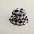 Detalle del gorro de pescador en tweed de cuadros blanco y negro con ribete marrón - 50cm (6-36 Meses) / Negro