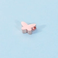 Macro shot of rose gold butterfly bead connector with a side hole for DIY jewelry - Rose Gold