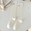 Beige cotton calf socks with black letter embroidery in a minimalist stylish layout - One Size / Cream
