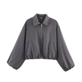 Detail of the dark gray bomber jacket zipper and woven fabric texture close-up - Gray