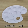 Oval white plastic art palette with thumb hole and 11 mixing wells measuring 23x17cm - Oval Palette Standard