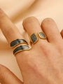 Golden double-layer and open rings set with grey marble texture on female hand - Black Marble Pattern Double Ring Open Set of 2