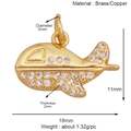 Macro detail of gold fighter jet pendant showing precise measurements and 1.32g weight - K720183-18mm Airplane