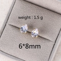Detailed view of pear-cut zircon earrings in gold frame with 6x8mm size and 1.5g weight - 8MM Water Drop Gold