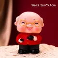 Cartoon grandfather figurine for cake topper, holding a teapot in traditional red suit - Vinyl Grandpa with Teapot