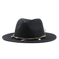 Detail of black straw Panama hat with wooden beads shell and leaf charm ornament - Black