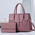 Detail of pink textured leather handbag set with gold hardware and shoulder strap - Pink