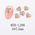 Detail of 8x7.5mm heart nail charms in silver micro-pave and gold mirror finish - L286-Gold Silver Dual Tone Heart with Rhinestones