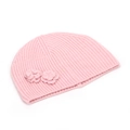 Close-up of pink knit beanie featuring delicate crochet flower decorations and ribbed texture - One Size / Pink