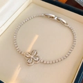 Close-up of silver flower bracelet with pear-cut cubic zirconia in a jewelry box - Silver