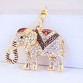 Golden elephant keychain with sparkling rhinestones and colorful enamel accents - Black
