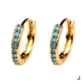 Detailed macro of 18K gold huggie earrings with round turquoise gemstone inlay - Turquoise