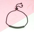 Detail of adjustable black woven rope bracelet with matte curved metal ID bar - Curved Bar Black (MP168)