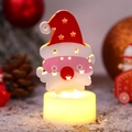 Luce LED natalizia con Babbo Natale e intagli a stella con luce calda soffusa - Babbo Natale