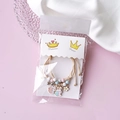 Detail of couple bracelets with cute rabbit charms and adjustable woven cord - Crown Display Cards