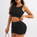 Women's black seamless ribbed sports set with cropped tank top and high-waist shorts - S / Black