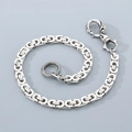 Close-up of stainless steel wallet chain featuring a skull clasp and braided Cuban links - Flat Byzantine Chain (Skull Clasp) / 40cm (16 inch)