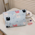 Detail view of a blue striped cat print canvas makeup bag with a secure zipper closure - Light Blue Stripe Cat