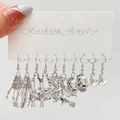 Gothic silver earring set with skull, mushroom, and witch charms on a card holder - Antique Silver (10293)