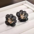 Retro hollow black mesh flower stud earrings with gold plating and clear crystal centers - Black-Gold