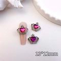 Close-up of 13x12mm silver crown nail charms with pink heart rhinestones for manicure - Silver - Rose Red
