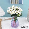 Bouquet of white artificial daisies in a blue gradient glass vase for home decoration - White