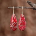 Red emperor stone teardrop earrings with gold hooks and natural marbled texture - Red