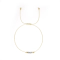 Verstellbares Kordelarmband mit weißen Marmorperlen und goldenen Akzenten im Minimalismus - Mondstein - Einzelstück