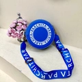 Borsa a tracolla rotonda blu con stampa di lettere bianche e ampia tracolla regolabile - Blu