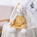 Plüschtier Hase in Weiß mit gelbem Herzchenkleid und passender Schleife am Kopf - Kaninchen