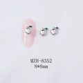 Detailed view of peach-shaped nail art charms with dimensions 8x8mm and silver finish - Bright Silver Peach (White K Base) (8352)