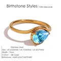 Gold-plated stainless steel ring featuring a pear-cut light sapphire zircon stone - US 6 / March Light Blue