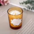 Amber glass scented soy candle in brown jar with Enjoy Your Life label and paper lid - Pomegranate Noir