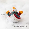 Miniature Christmas snowman figurine in red coat and orange hat, 4.5cm tall decoration - Snowman with Yellow Gloves