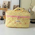 Beauty case trapuntato a scacchi gialli con fiocchi rosa e manico superiore - Borsa a Mano Grande