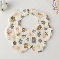 Detailed close-up of 100% cotton gauze baby bib with brown bear and floral patterns - Gauze Flower Wrap - Garden Bear
