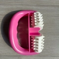 Pink handheld manual roller massager with dual white spiked rollers for body relief - 1023 Point Neck Massager Rose Red