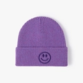 Purple ribbed knit beanie featuring a smile face embroidery for winter outdoor warmth - One Size / Heather Purple