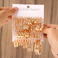 Fashion jewelry set with golden hoop earrings and white pearls on a display card - 24 KC Gold