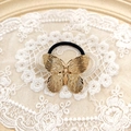 Elegant gold hollow butterfly hair tie with a black elastic band for women - Gold Butterfly