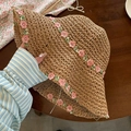 Detailed close-up of straw sun hat featuring delicate pink floral embroidery on the brim - L (58-60cm) / Pink Flower Decor Khaki