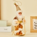 Champagne gold Santa Claus skiing figurine with plush details and metal bell - Skiing Style (Gold Crackle)