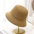 Hollow knit bucket hat for women in mustard yellow with a sleek metal logo plate detail - M (56-58cm) / Camel
