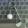 Golf club and white golf ball keychain charm with silver metal link on black keyboard - 4.8cm*3.8cm / New Edition Golf Keychain White