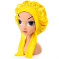 Yellow satin baby bonnet with bow and long tails on a doll head, soft sleep cap - One Size / Yellow