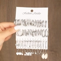 Chic silver earring set with pearl, butterfly, and hoop designs on display card - Silver Pearl Butterfly Shell Style (5922802)