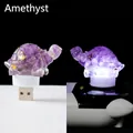 Amethyst turtle night light with gold foil accents and USB plug showing glow effect - Amethyst