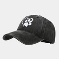 Detail view of washed cotton texture and white heart paw print on the baseball cap - Adjustable / Black
