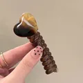 Cute amber heart spiral hair coil with tortoiseshell texture for girls hair styling - Coffee Heart/Brown Spiral